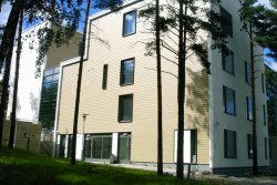 Tapiolan terveysasema toteutettiin elinkaarimallillaIkilaudasta elaumlvauml ja huoltovapaa julkisivu (photo: Administrator)