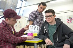 <p>Dan Thorne, Craig McFarlane and Eddie Magee, design students at the University of the Creative Arts in Epsom showing their idea of how to convey Iggesund’s environmental performance.© Iggesund</p> (photo: )