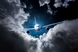 <p>Passenger airliner flying to dark clouds</p> (photo: Andrey Armyagov)