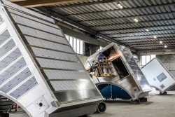 <p>Workshop view: <em>Prime</em>Dry Hood technology to improve heat-transfer efficiency and optimize drying. © ANDRITZ</p> 