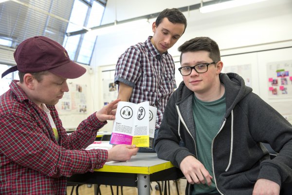 <p>Dan Thorne, Craig McFarlane and Eddie Magee, design students at the University of the Creative Arts in Epsom showing their idea of how to convey Iggesund’s environmental performance.© Iggesund</p>