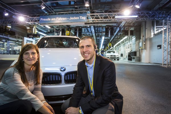 <p>The lucky customers in the BMW plant in Munich where their new BMW 328i xDrive Touring was made.© BMW AG</p>