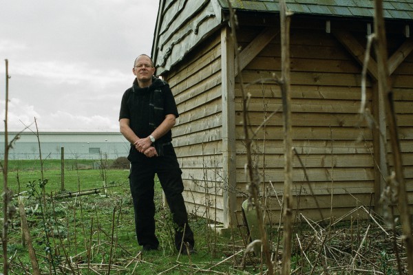 <p>Bruce Podmore at “the bat cave”, a building designed to help the local bat population reproduce, a requirement for Windles present location. </p>