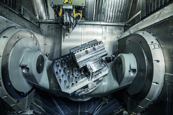 <p>Figure 4 shows the working area of the C 22 UP machining centre with the swivelling rotary table measuring 320 mm in diameter (axes A and C) for 5-axis complete/simultaneous machining of tool components in a single setup</p>